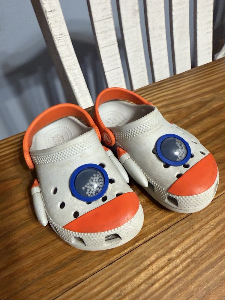 Crocs Kids Classic Rocket Ship Space Clog Gray/Orange Moving Stars Size c10