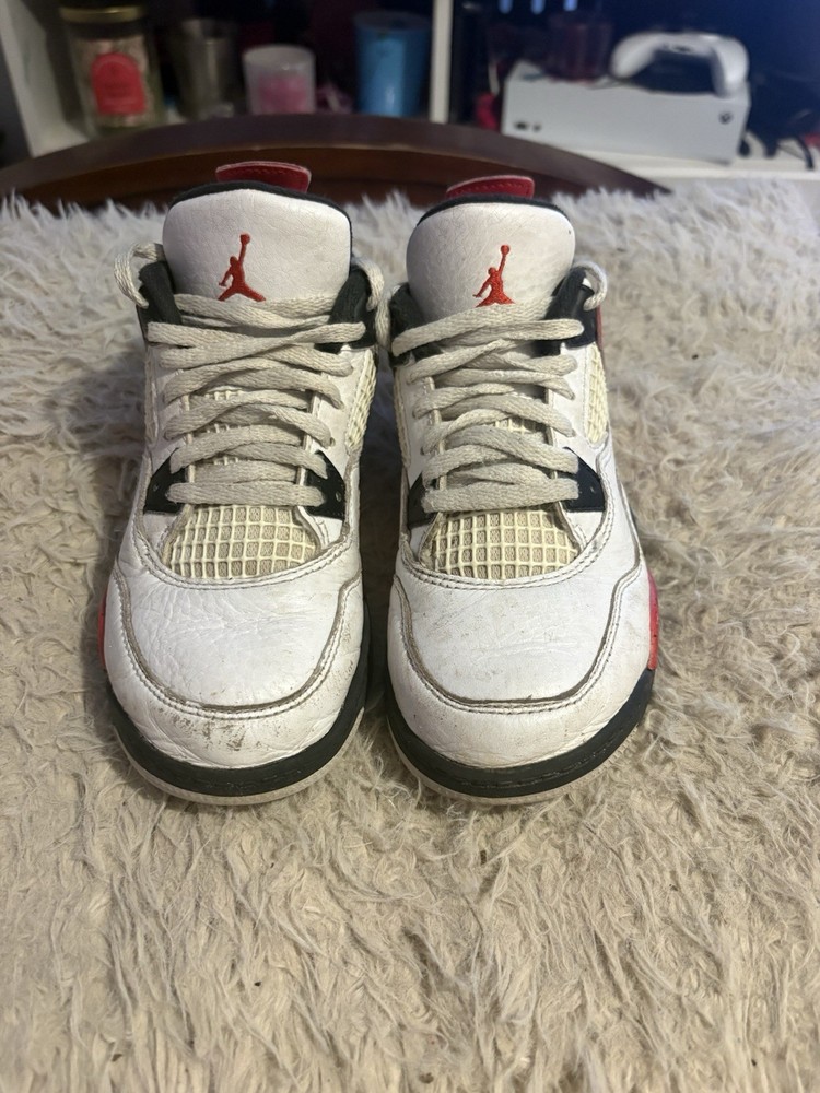 Air Jordan 4 Retro Red Cement sneakers white leather with red and black accents