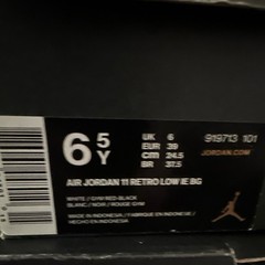 Nike Air Jordan 11 international Low White/Red/Black Unisex Kids Sneakers 6.5Y