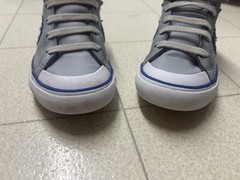 The image shows a pair of Converse Pro Blaze Strap Leather High Top sneakers