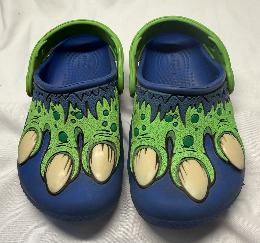 CROCS – Dinosaur Monster Feet Glow in The Dark – Children’s Slip On – Size C 8