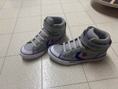 The image shows a pair of Converse Pro Blaze Strap Leather High Top sneakers