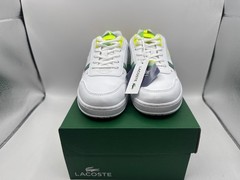 Lacoste T-Clip junior trainers feature a white synthetic upper with iridescent g
