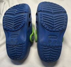 CROCS – Dinosaur Monster Feet Glow in The Dark – Children’s Slip On – Size C 8