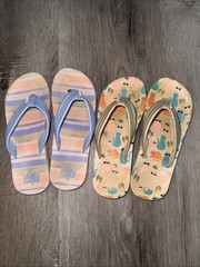 Two Pairs Of Kids Reef Flip Flop Sandals