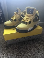 Size 6.5 (GS) – Jordan 4 Retro 2021 Mid Lightning