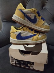 Travis Scott Jordan 1 Low Canary