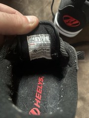 These Heelys Pro 20 Prints feature a black with red and yellow flame graphics
