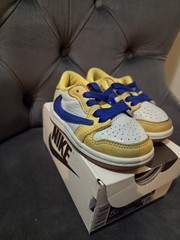Travis Scott Jordan 1 Low Canary