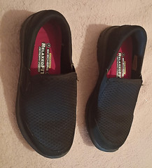 Black slip-on Skechers RelaxedFit Memory Foam shoes, unisex youth size 5