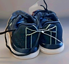 Under Armour Assert Paint Splatter black tile blue shoes youth size 7Y