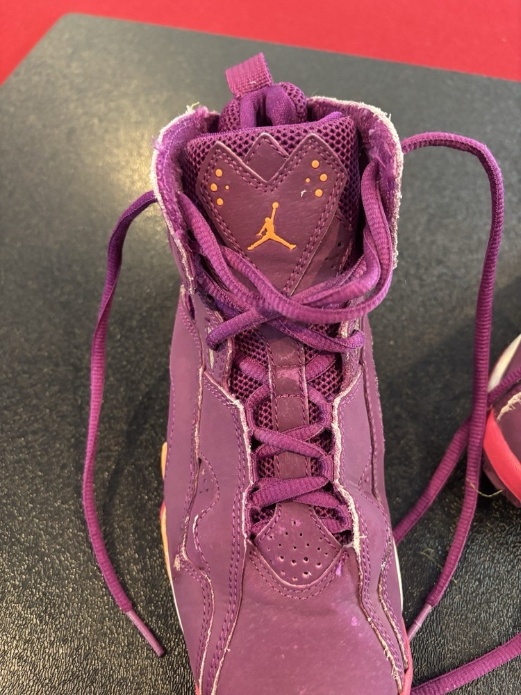 Nike Jordan 7’s Size 3.5Y US Color Magenta, Pink, orange, And White.