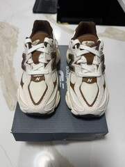 New Balance 9060 Unisex Sneakers Size 11 kids Brown Beige.