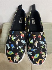 Kids TOMS Alpargata Classic slip-on in black with a colorful Insect Mushroom