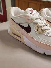 Nike Air Max 90 EasyOn in the Phantom, Echo Pink, Sail, and Dark Team Red.