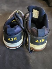 vintage or retro-style athletic sneakers featuring a chunky design,…