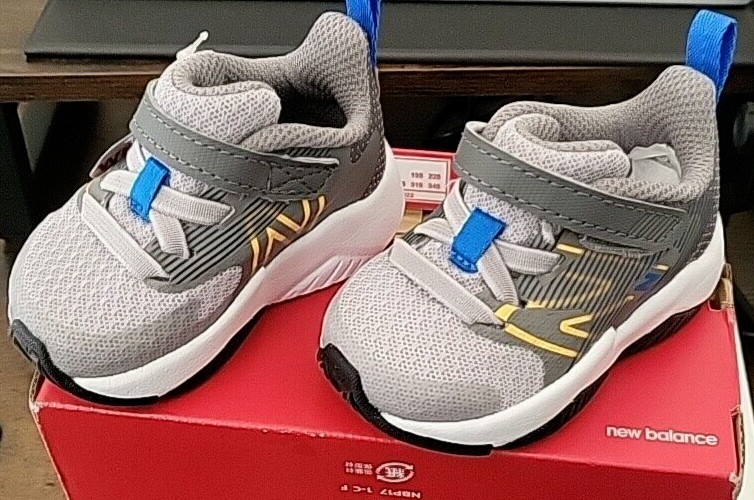 New Balance Kid’s Rave Run V2 Hook and Loop Running Shoe, Rain Cloud/Vibrant…