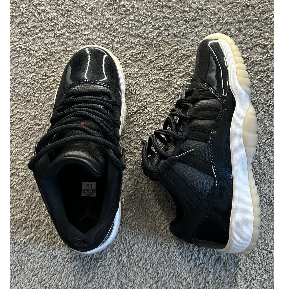 Jordan Air Jordan 11 Low Top Leather Lace-Up Sneakers Black/White Kids 5.5Y