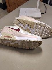 Nike Air Max 90 EasyOn in the Phantom, Echo Pink, Sail, and Dark Team Red.
