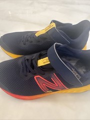 New Balance FuelCore Reveal Kids Sneakers Navy/Red/Yellow very good condition