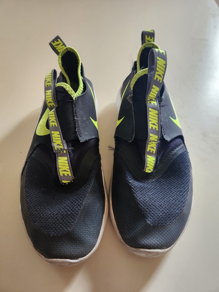 Nike Kids Slip-On Sneakers in Black and Volt Green
