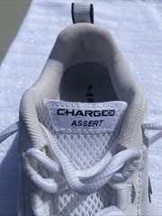 Under Armour Charged Assert 6.5 Shoes White Youth Sneakers