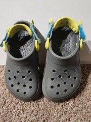 CROCS Kids Gray Clogs with Yellow and Blue Accents