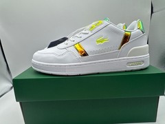 Lacoste T-Clip junior trainers feature a white synthetic upper with iridescent g