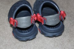 Crocs Crocband clogs in navy blue with a red and white midsole stripe Size J 6