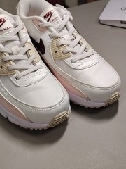 Nike Air Max 90 EasyOn in the Phantom, Echo Pink, Sail, and Dark Team Red.