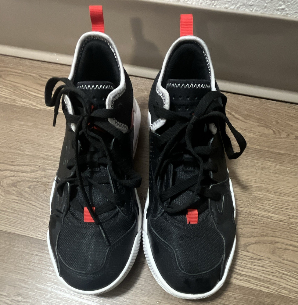 Nike Air Jordan Stay Loyal 2 sneakers in a black, university red, and white colo