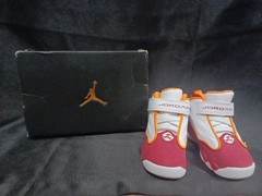 Kids Jordan Pro Strong 6c orange, White, And Red.