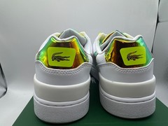 Lacoste T-Clip junior trainers feature a white synthetic upper with iridescent g