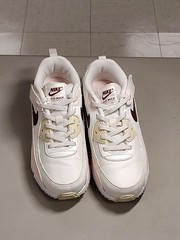 Nike Air Max 90 EasyOn in the Phantom, Echo Pink, Sail, and Dark Team Red.