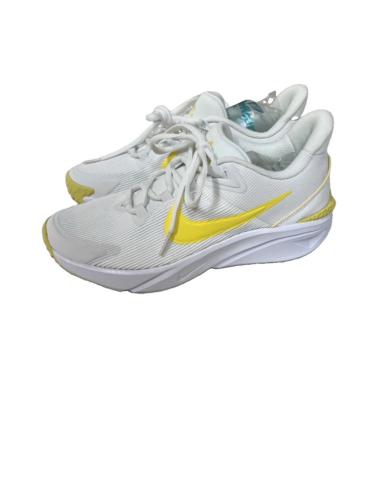 Nike Star Runner 4, Running Shoe white with vibrant yellow Swoosh Size 5Y