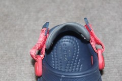 Crocs Crocband clogs in navy blue with a red and white midsole stripe Size J 6