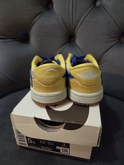 Travis Scott Jordan 1 Low Canary