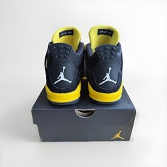 Nike Air Jordan 4 Retro Thunder 408452-017 Youth 4.5Y / Women’s 6 Black Yellow
