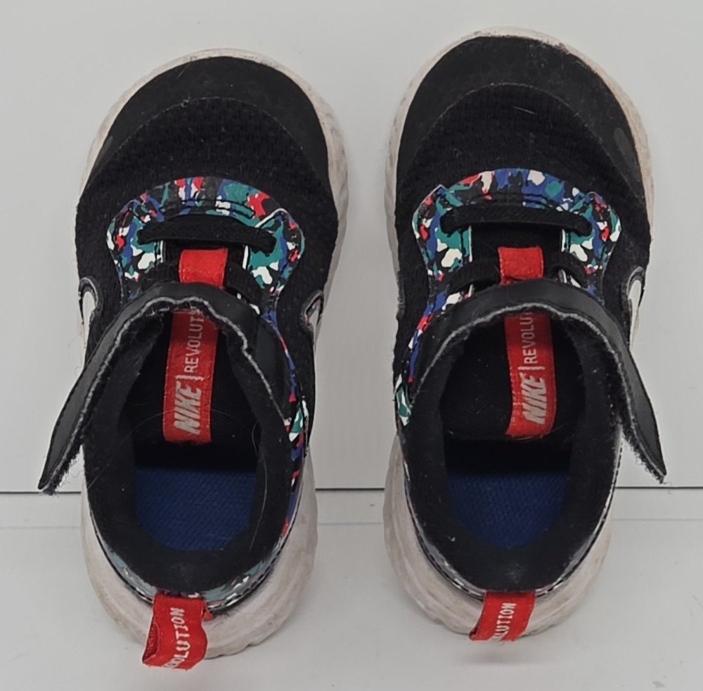 NIKE Revolution Child’s Sneaker Size 7C Funky Black W/Red, Green & Blue Accents