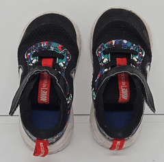 NIKE Revolution Child’s Sneaker Size 7C Funky Black W/Red, Green & Blue Accents
