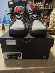 Nike Air Jordan True Flight sneakers in a black, varsity red, and wolf gray